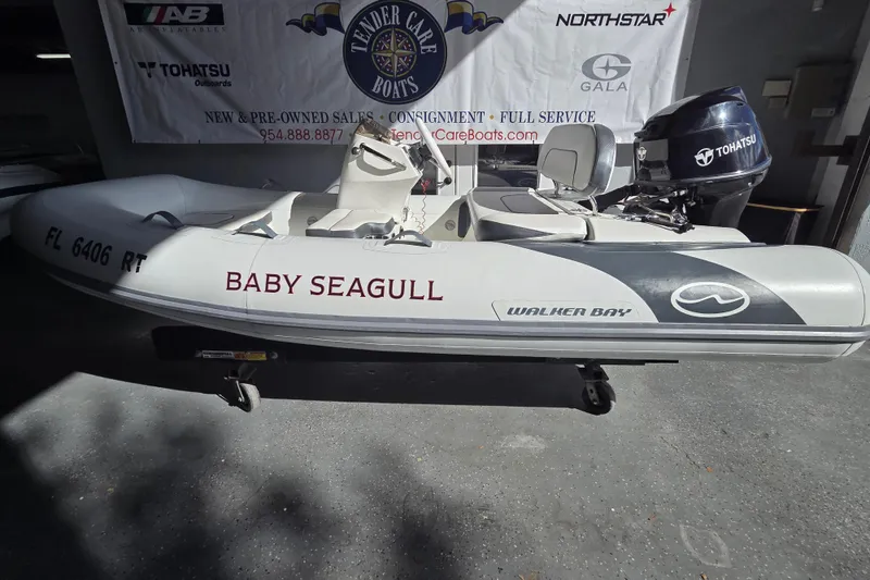 The Image of 2018 Walker Bay Supertender 365 inflatable boat with Tohatsu outboard motor, labeled "Baby Seagull." - 1