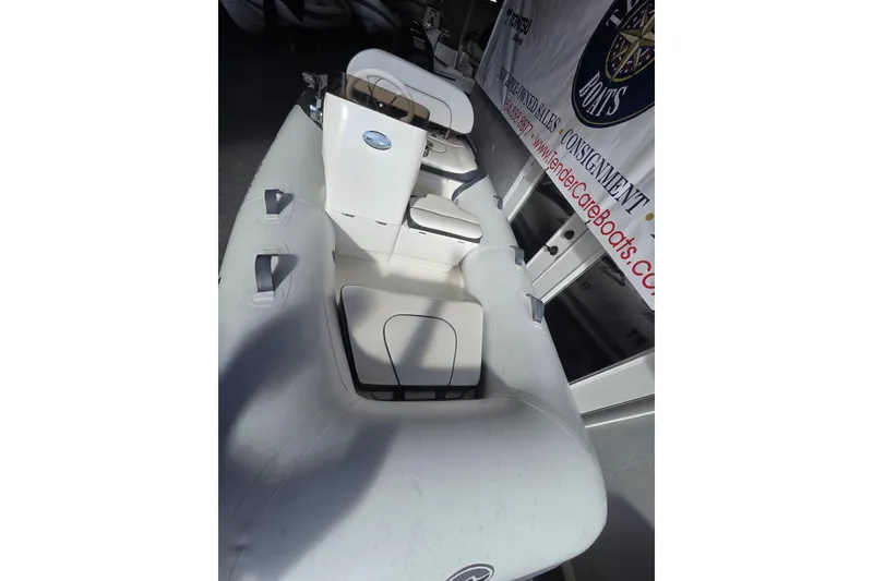 Slide: The Image of 2018 Walker Bay Supertender 365 inflatable boat interior with seating and console. - 4