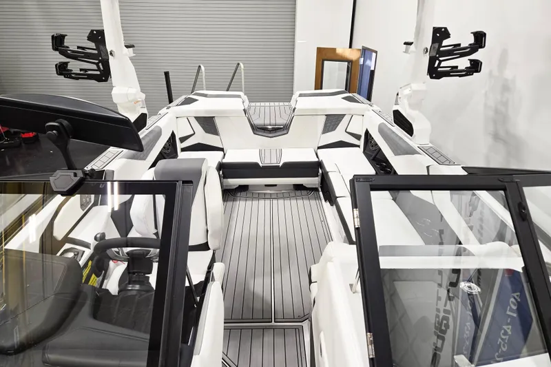 Slide: The Image of 2026 Nautique Super Air Nautique S23 interior with sleek seating and modern design. - 7