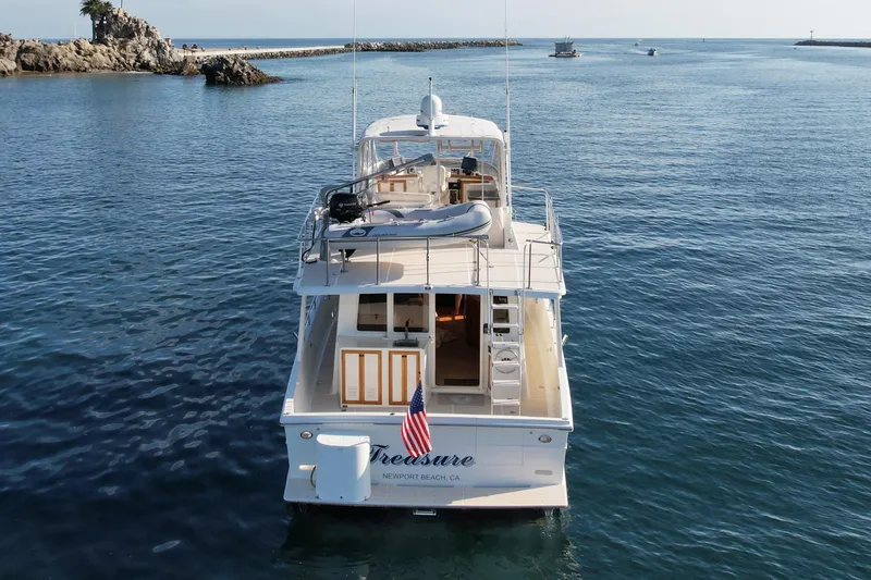 Slide: The Image of Offshore Yachts 1997 48 Sedan cruising in calm waters near Newport Beach. - 9