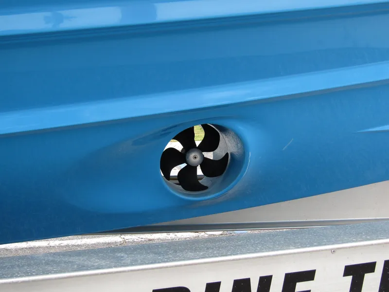 Slide: The Image of Close-up of a blue 2024 Axopar 37 Sun Top boat thruster. - 12