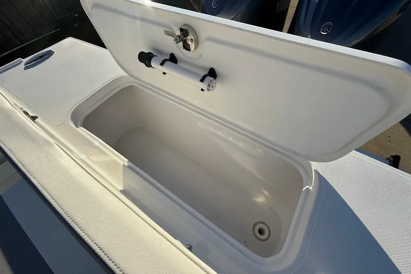 Slide: The Image of Open storage compartment on 2023 Steiger Craft 31 Chesapeake boat. - 11