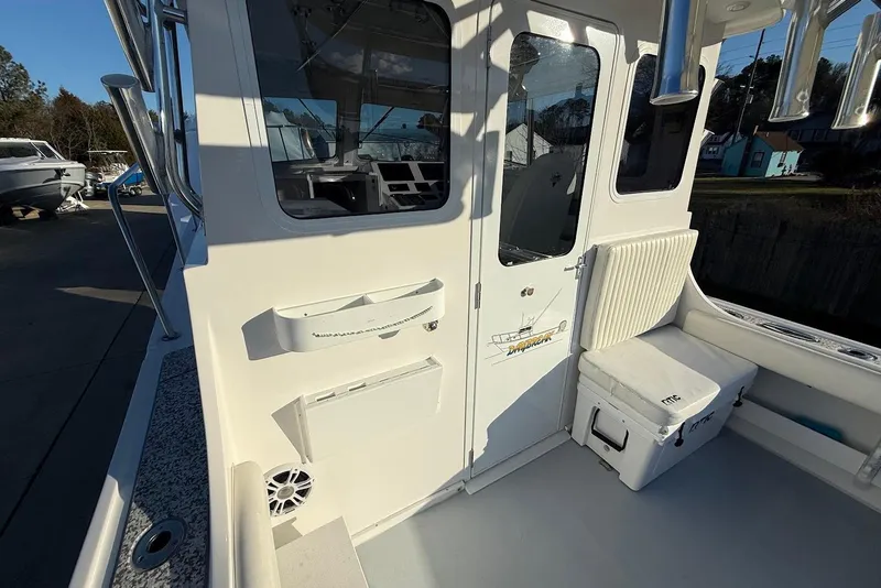 Slide: The Image of 2023 Steiger Craft 31 Chesapeake boat interior with seating and storage features. - 19