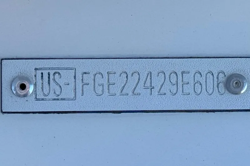 Slide: The Image of Hull identification number on a 2006 Cobalt 220 boat. - 34