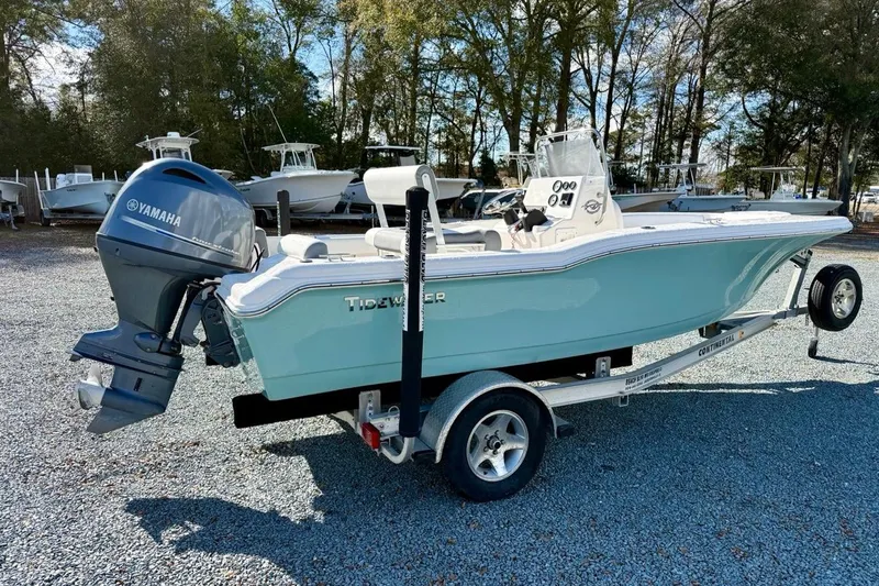 Slide: The Image of 2020 Tidewater 180 CC Adventure boat on trailer with Yamaha outboard motor. - 2