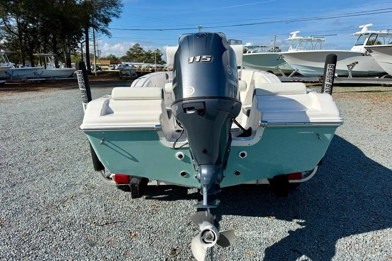 Slide: The Image of 2020 Tidewater 180 CC Adventure boat with Yamaha 115 outboard motor, parked on gravel. - 4