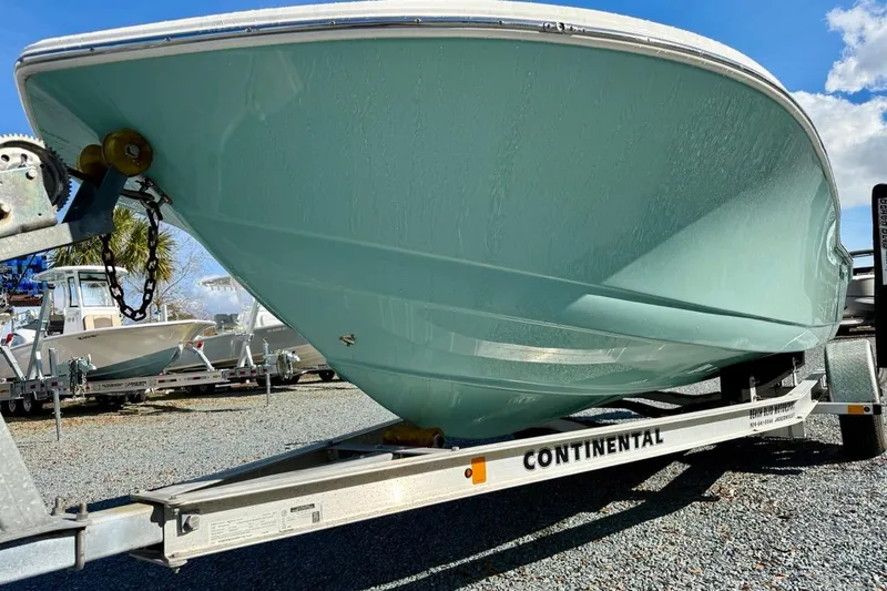 Slide: The Image of 2020 Tidewater 180 CC Adventure boat on Continental trailer, parked outdoors. - 9