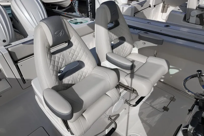 Slide: The Image of Luxurious seating on 2026 Sailfish 272 CC boat, featuring plush, ergonomic design. - 14