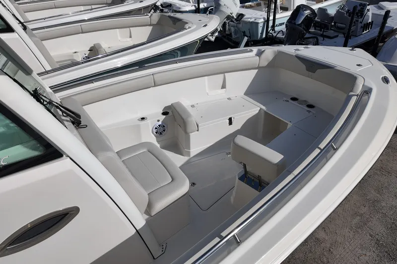 Slide: The Image of 2026 Sailfish 272 CC boat interior with seating and storage compartments. - 7