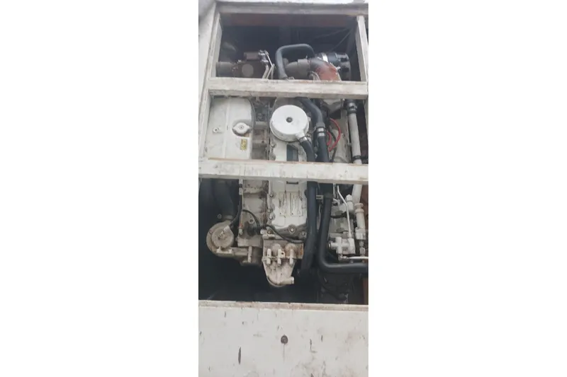 Slide: The Image of Engine of a 1964 Myron Harris 35 Flybridge boat, showcasing mechanical components. - 5