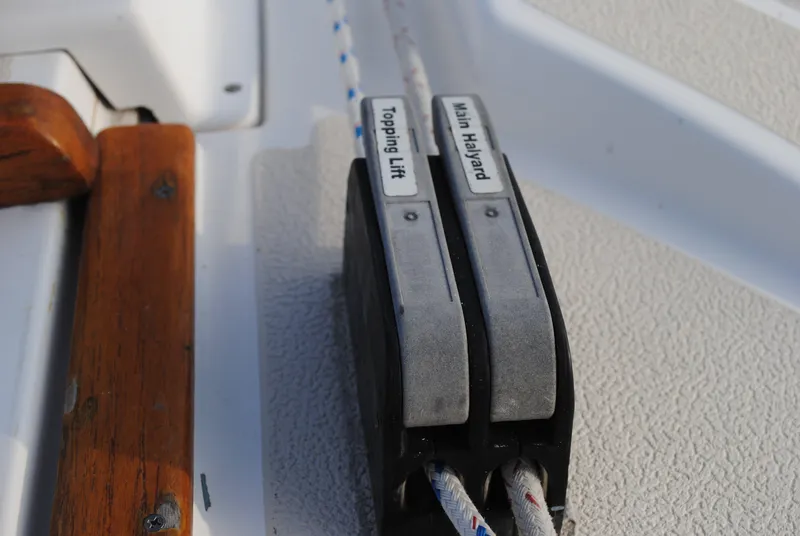 Slide: The Image of Close-up of rope clutches on a 1988 Tartan 28 yacht. - 13