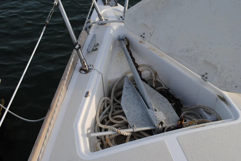 Slide: The Image of Anchor and ropes in the bow hatch of a 1988 Tartan 28. - 16