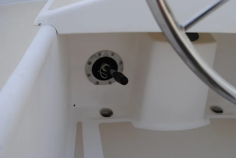 Slide: The Image of Steering wheel and controls of a 1988 Tartan 28 sailboat. - 17