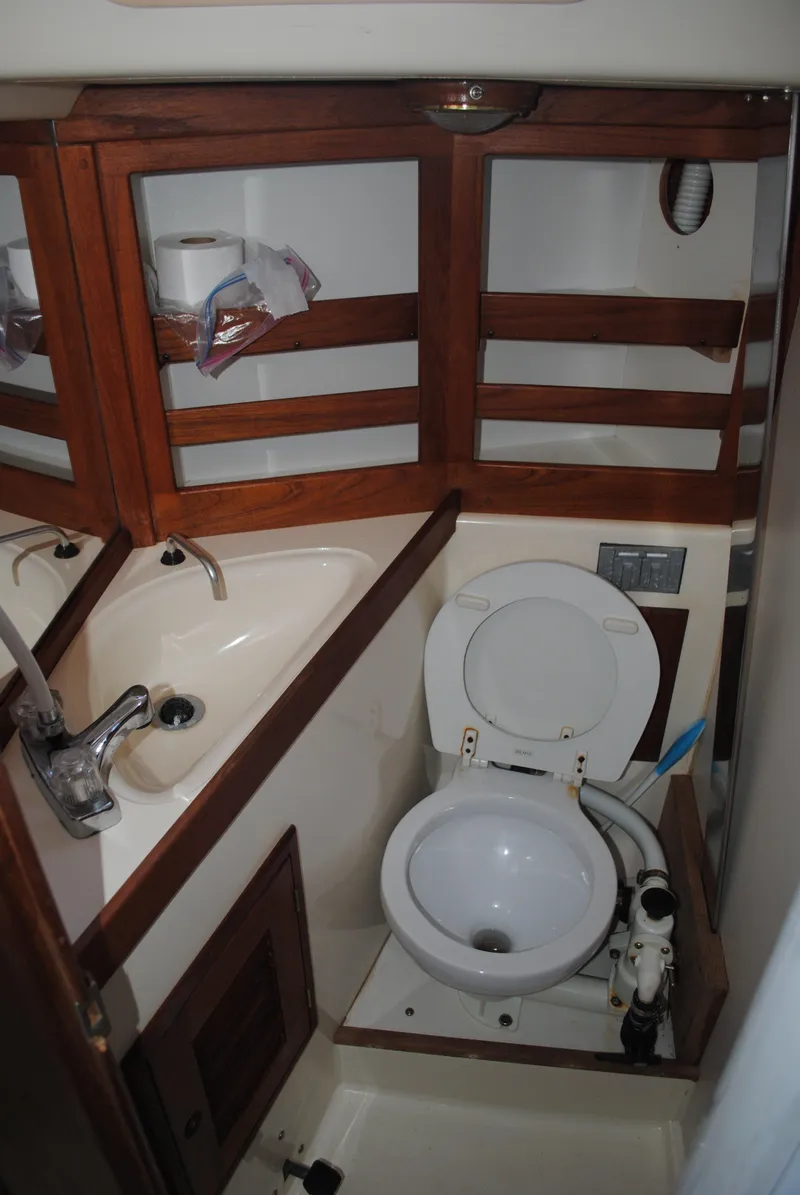 Slide: The Image of Compact bathroom in a 1988 Tartan 28 yacht. - 22