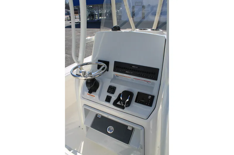 Slide: The Image of 2026 Pathfinder 2400 Open boat console with steering wheel and controls. - 10