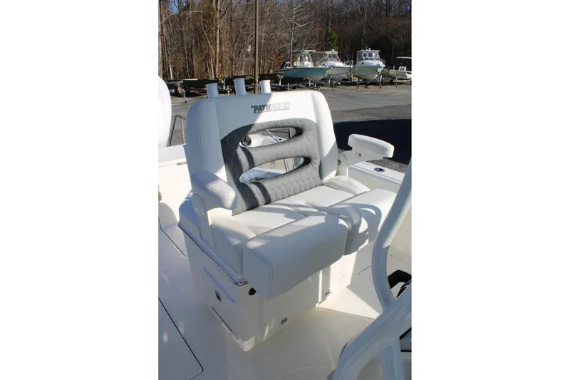 Slide: The Image of 2026 Pathfinder 2400 Open boat seat with sleek white and gray design. - 12