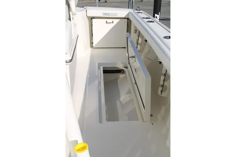 Slide: The Image of 2026 Pathfinder 2400 Open boat interior with storage compartments and sleek design. - 22
