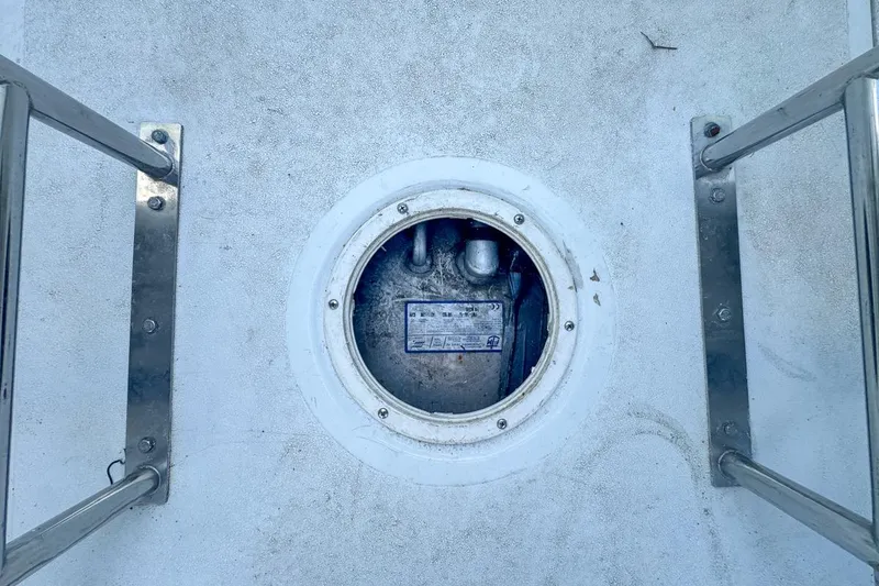 Slide: The Image of Baja 29 Outlaw 1999 boat hatch with metal frame. - 65