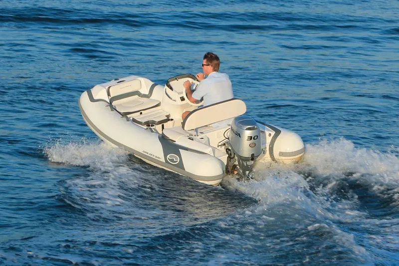 Slide: The Image of Manufacturer Provided Image: Walker Bay Generation 10 LTE 2025 boat cruising on open water. - 4