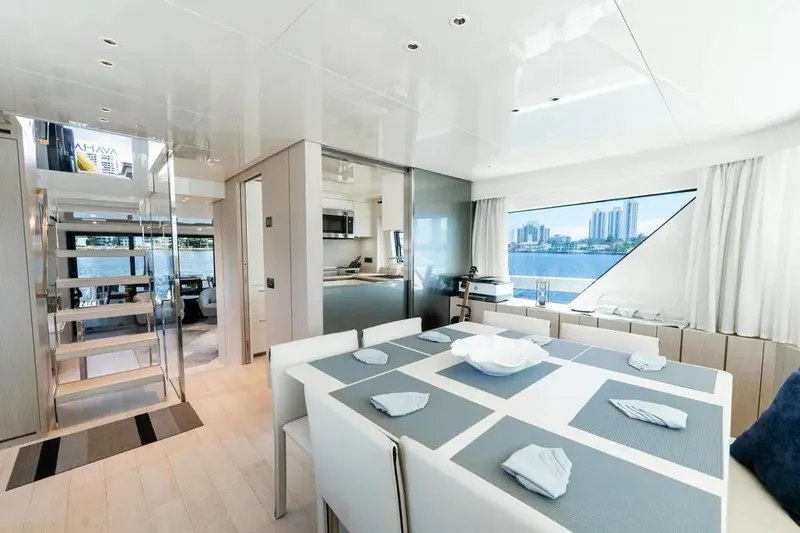 Slide: The Image of Luxurious interior of 2021 Sanlorenzo SX76 yacht with modern dining area and scenic window view. - 26