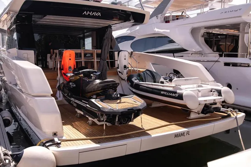 Slide: The Image of 2021 Sanlorenzo SX76 yacht with jet ski and tender docked in Miami. - 46
