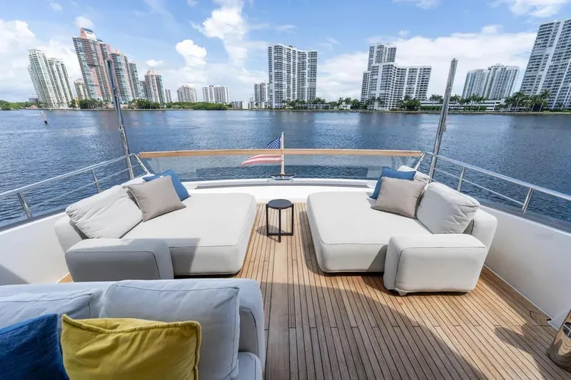 Slide: The Image of Luxurious 2021 Sanlorenzo SX76 yacht deck with city skyline view. - 8