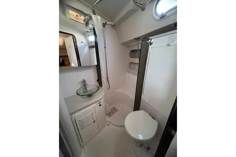 Slide: The Image of 2016 Catalina 385 yacht bathroom with shower, sink, and toilet. - 10