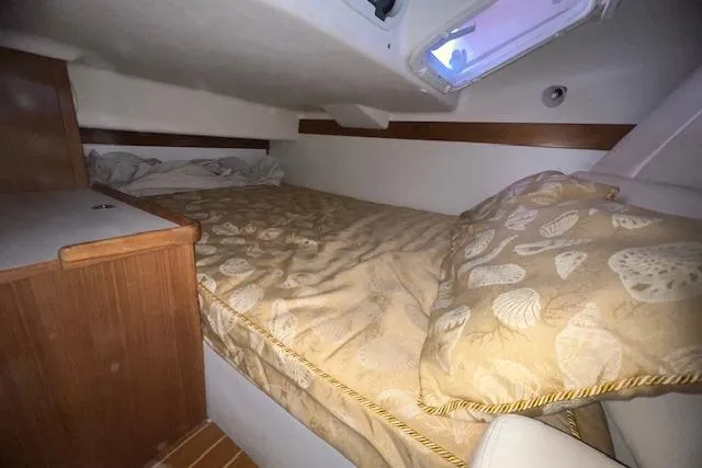 Slide: The Image of Cozy cabin interior of 2016 Catalina 385 sailboat with comfortable bedding. - 16