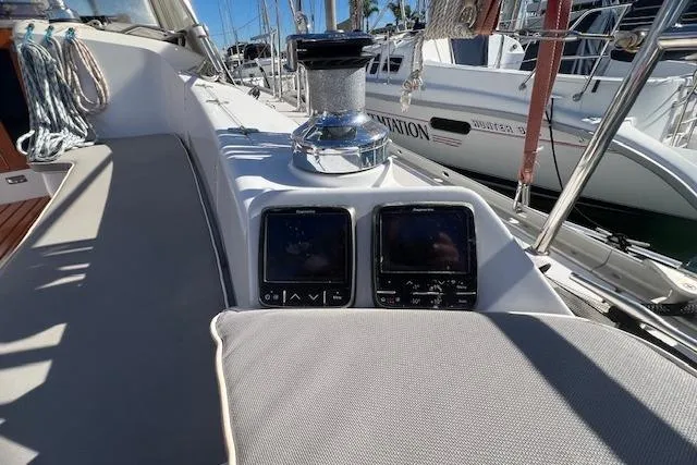 Slide: The Image of Cockpit of 2016 Catalina 385 sailboat with navigation instruments and winch. - 22
