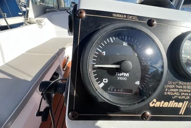 Slide: The Image of Close-up of a Catalina 385 tachometer, showing Yanmar Diesel engine RPM gauge. - 23
