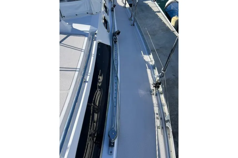 Slide: The Image of 2016 Catalina 385 sailboat deck with sleek design and modern fittings. - 30