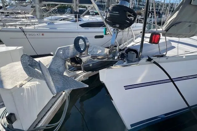 Slide: The Image of Catalina 385 sailboat, 2016 model, docked with visible anchor and equipment. - 34