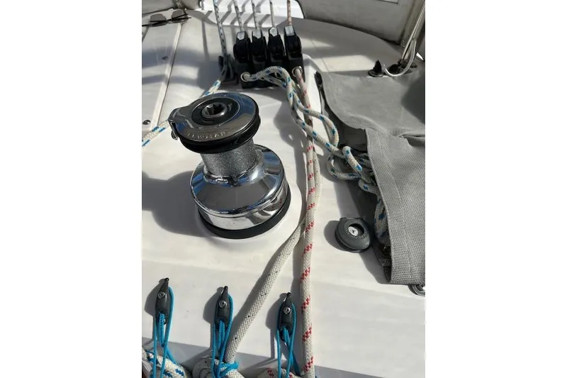 Slide: The Image of Deck of 2016 Catalina 385 sailboat with winch and ropes. - 38