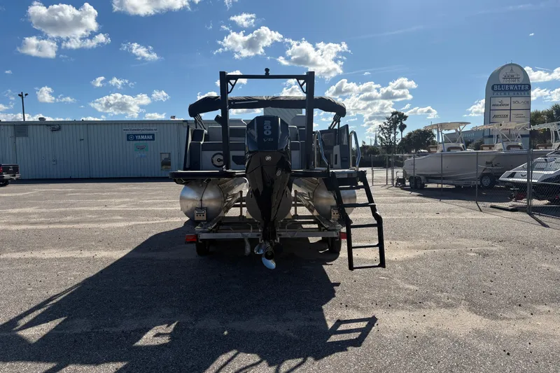 Slide: The Image of 2026 Alera M 23L boat with Yamaha engine in a sunny marina. - 3