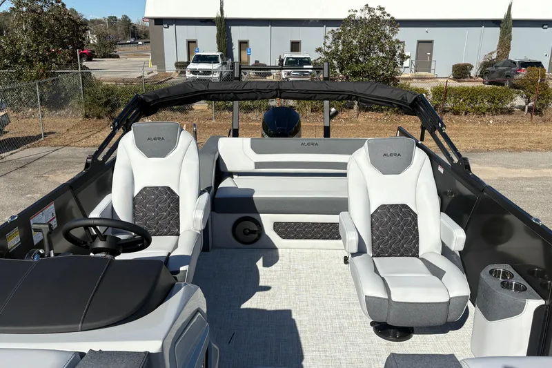 Slide: The Image of 2026 Alera M 23L boat interior with modern seating and steering wheel. - 8