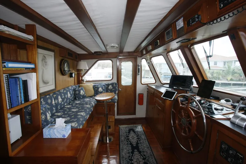 Slide: The Image of Interior of 1982 DeFever 52 Offshore Cruiser with nautical decor and navigation equipment. - 16