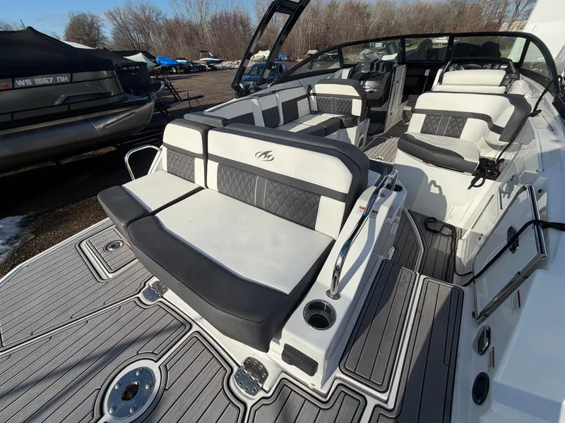 Slide: The Image of Luxurious 2023 Monterey M6 boat with sleek seating and modern design. - 13
