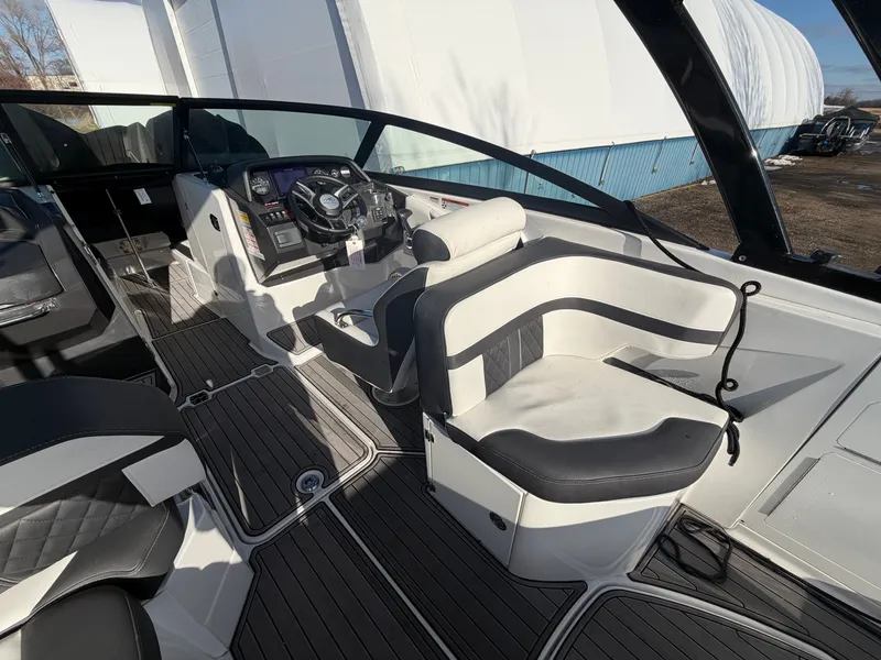 Slide: The Image of Interior of a 2023 Monterey M6 boat with modern cockpit. - 16