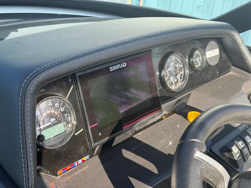 Slide: The Image of Dashboard of a 2023 Monterey M6 boat with Simrad display. - 20