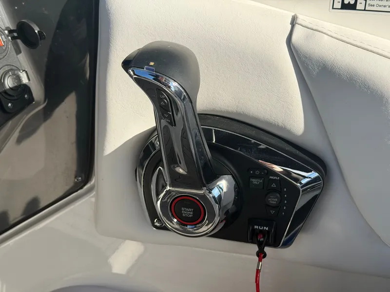 Slide: The Image of Monterey M6 2023 boat control with start-stop button. - 22