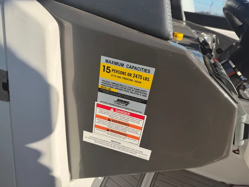Slide: The Image of Safety label on Monterey M6 boat, maximum capacity 15 persons. - 24