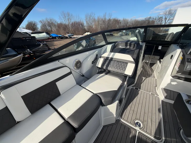 Slide: The Image of Interior of a 2023 Monterey M6 boat with luxurious seating. - 26