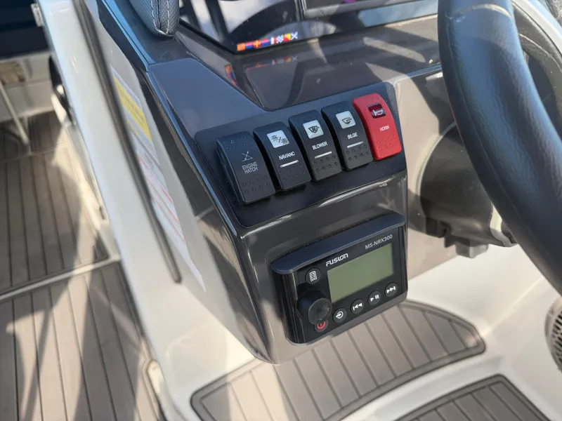 Slide: The Image of 2023 Monterey M6 control panel with switches and display. - 29