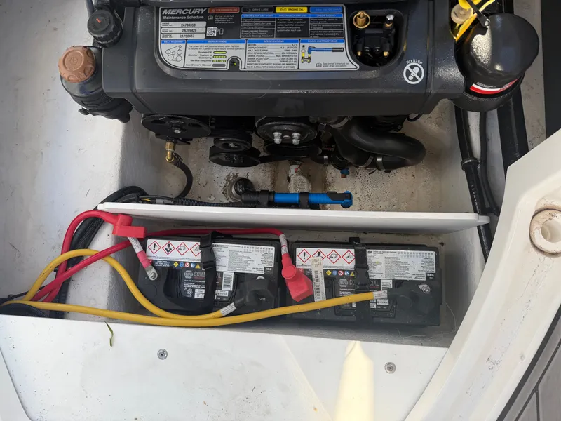 Slide: The Image of 2023 Monterey M6 engine compartment with batteries and wiring. - 36