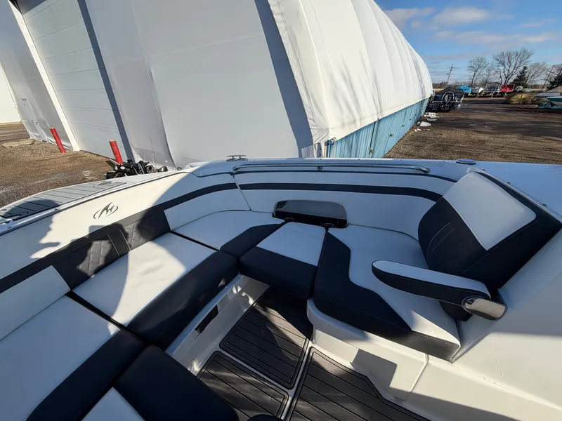 Slide: The Image of 2023 Monterey M6 boat with stylish outdoor seating area. - 42