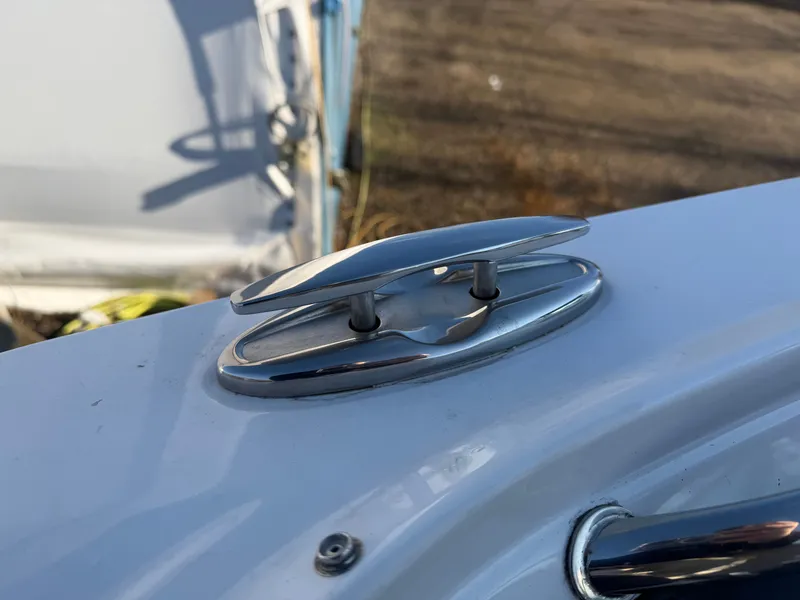 Slide: The Image of Close-up of boat deck with stainless steel cleat, Monterey M6 2023. - 46