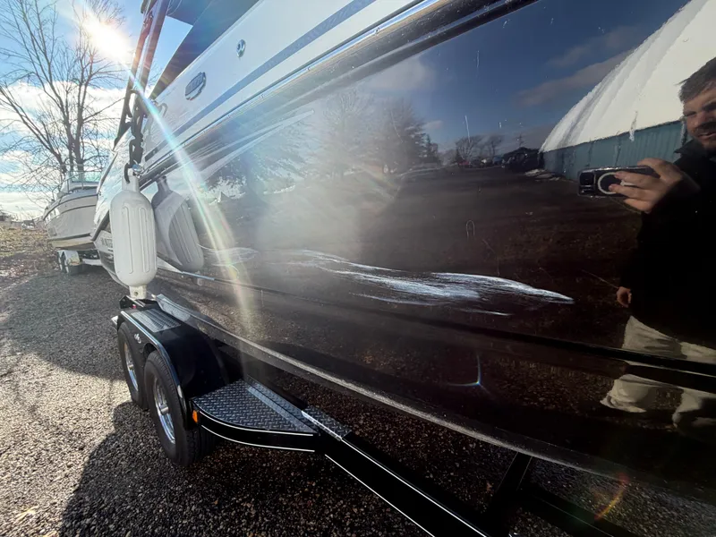 Slide: The Image of 2023 Monterey M6 boat with scratches on the side. - 9