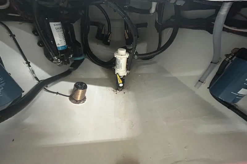 Slide: The Image of 2024 Contender 24 Sport boat interior wiring and components. - 17