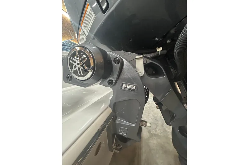 Slide: The Image of 2024 Contender 24 Sport boat engine detail with Yamaha logo. - 9