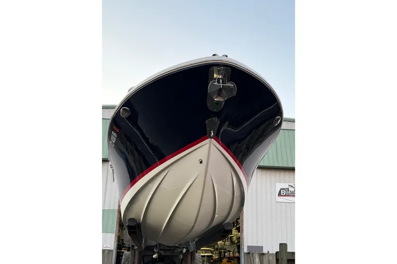 Slide: The Image of 2019 Chris-Craft Catalina 26 boat, viewed from below, showcasing sleek hull design. - 3
